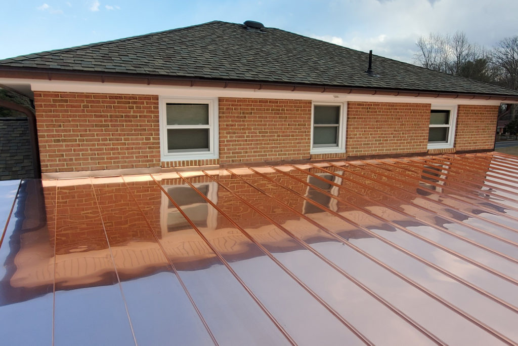 view from roof of residential home that has a brand new copper roof