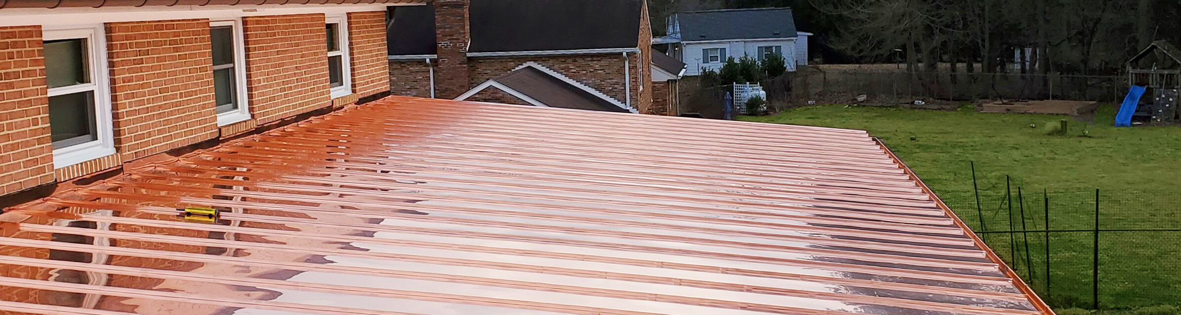 view from roof of residential home that has a brand new copper roof