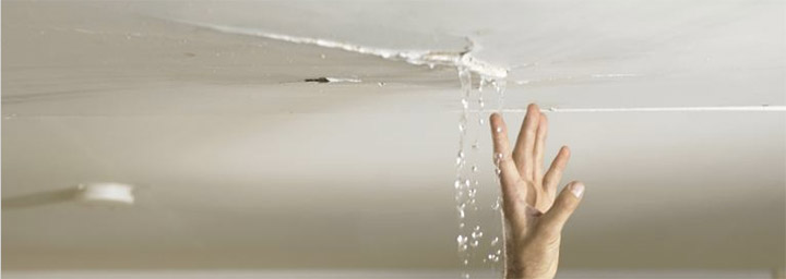 water leaking through the ceiling of a home
