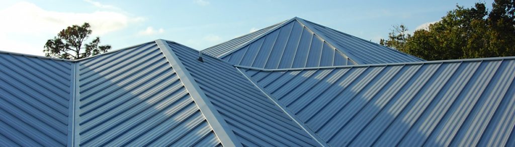 grey metal roof on a large home
