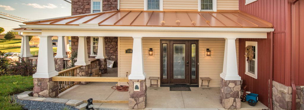 copper roof on wrap around porch of a maryland home