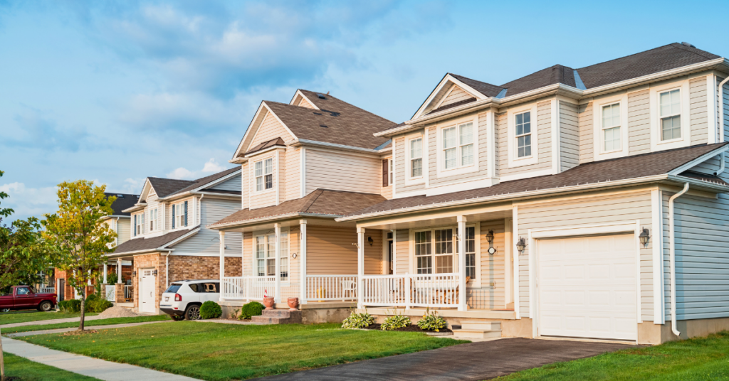 row of residential homes in need of roof maintenance