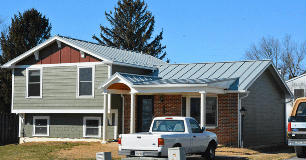 Metal roof maintenance being performed