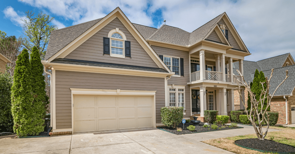 Residential home with roof underlayment for its asphalt shingles