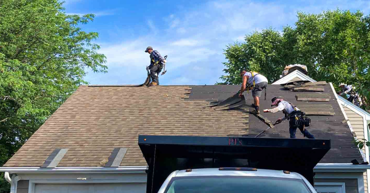 The PJ's Roofing team installing a new roof fopr the spring.